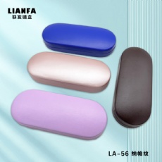 Champagne-colored round glasses case