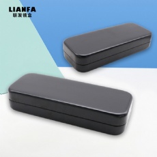 A black, simple and square glasses case