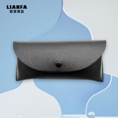 A black, stylish, soft - covered glasses case
