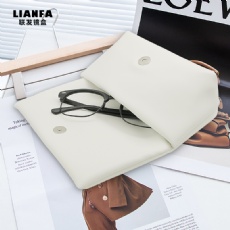 White soft - covered glasses case